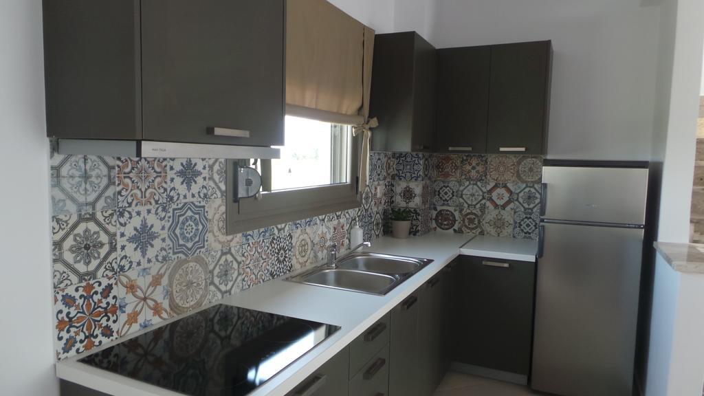 Niovi Boutique Apartments Афитос Номер фото