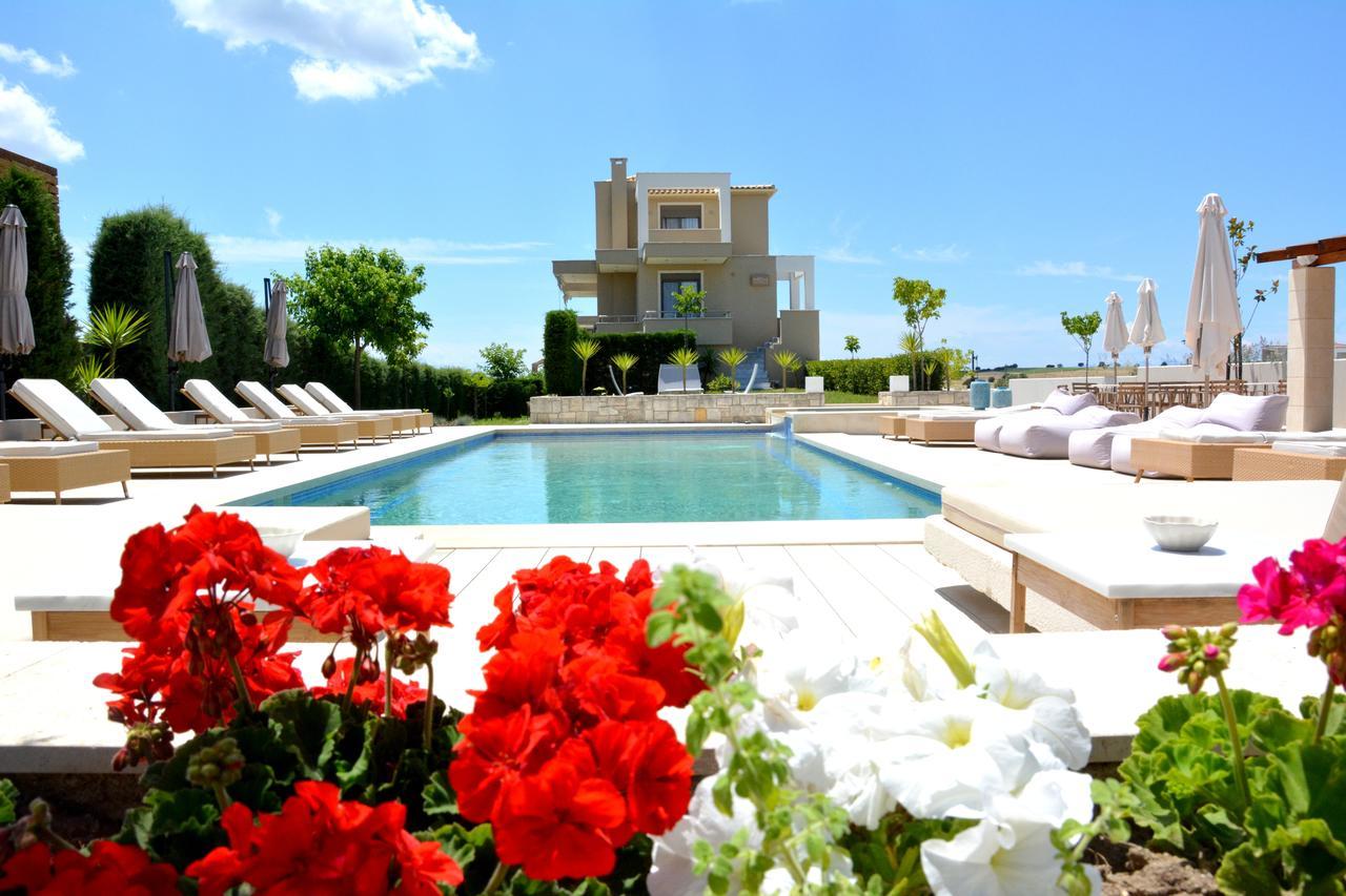 Niovi Boutique Apartments Афитос Экстерьер фото