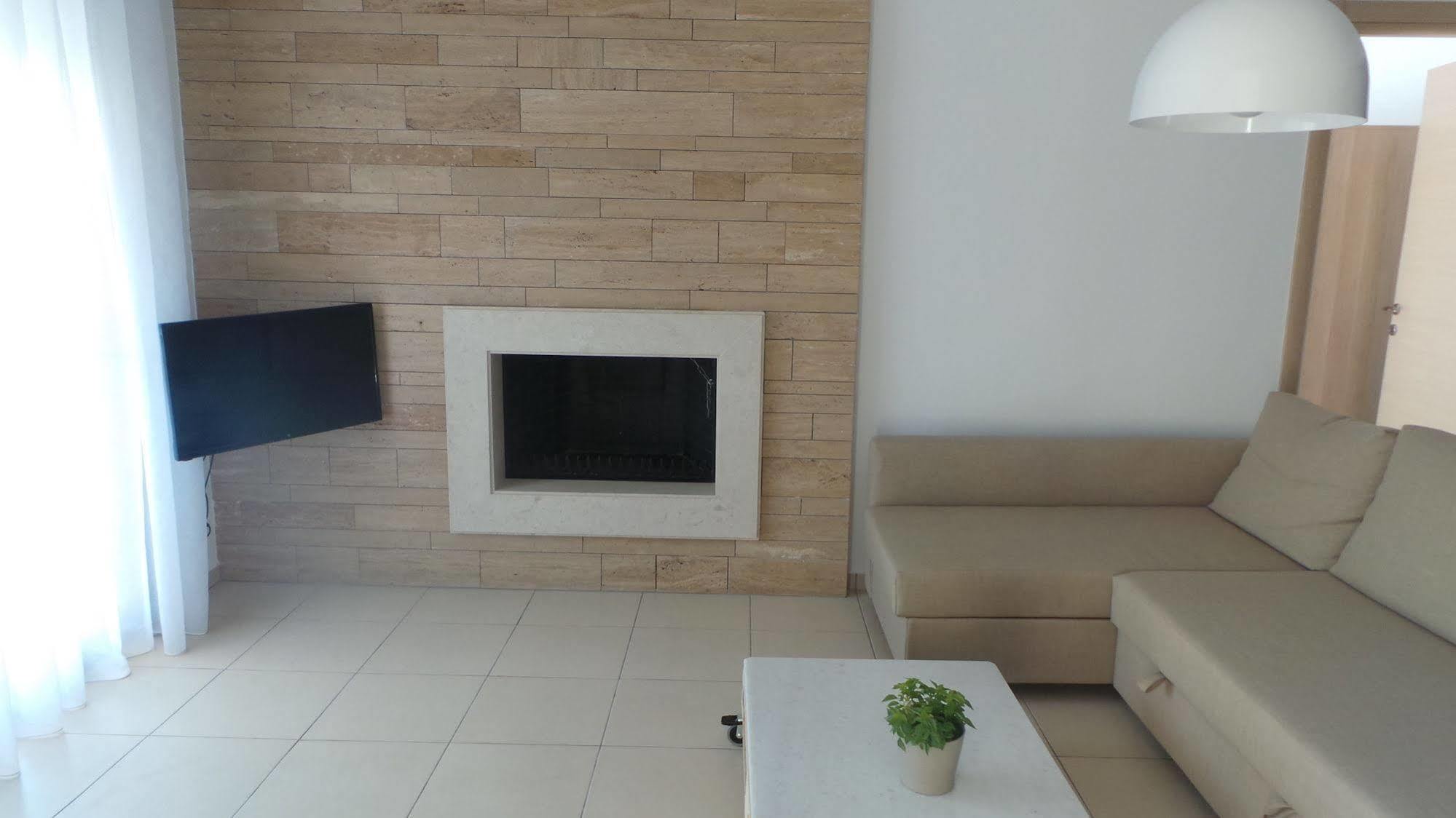 Niovi Boutique Apartments Афитос Экстерьер фото