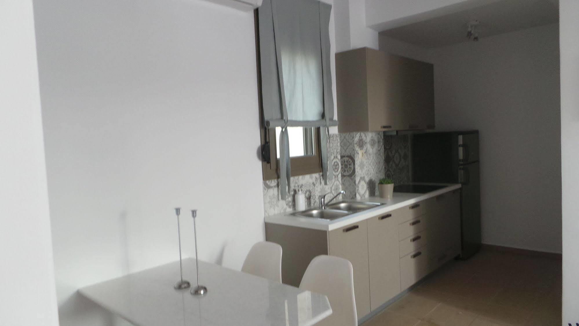 Niovi Boutique Apartments Афитос Экстерьер фото
