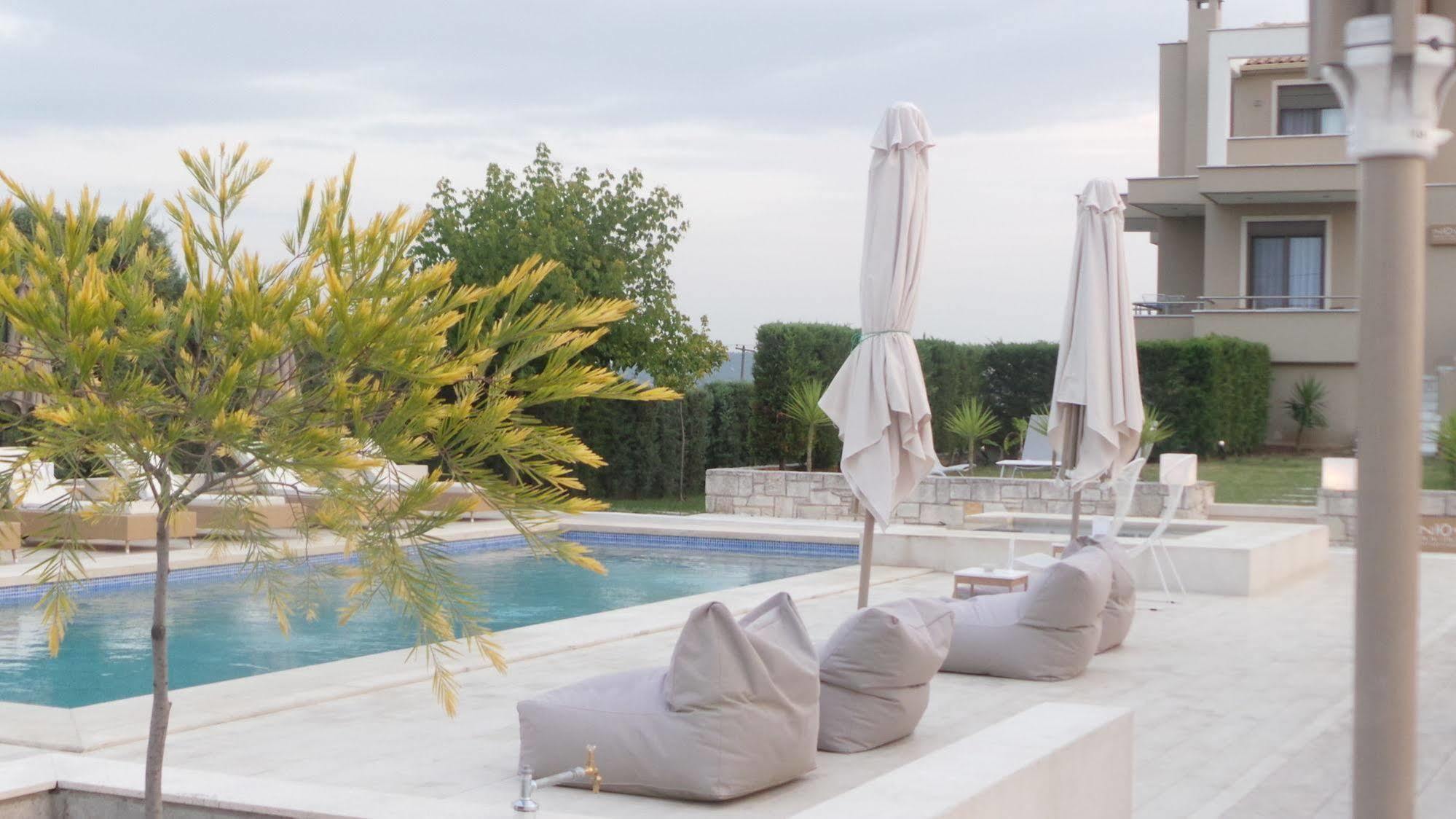 Niovi Boutique Apartments Афитос Экстерьер фото