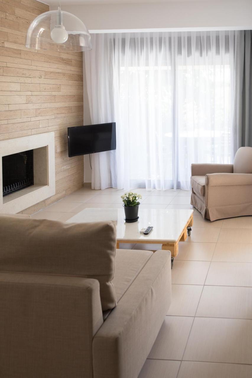 Niovi Boutique Apartments Афитос Экстерьер фото