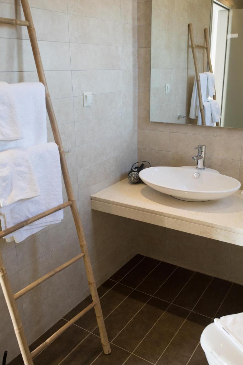 Niovi Boutique Apartments Афитос Экстерьер фото